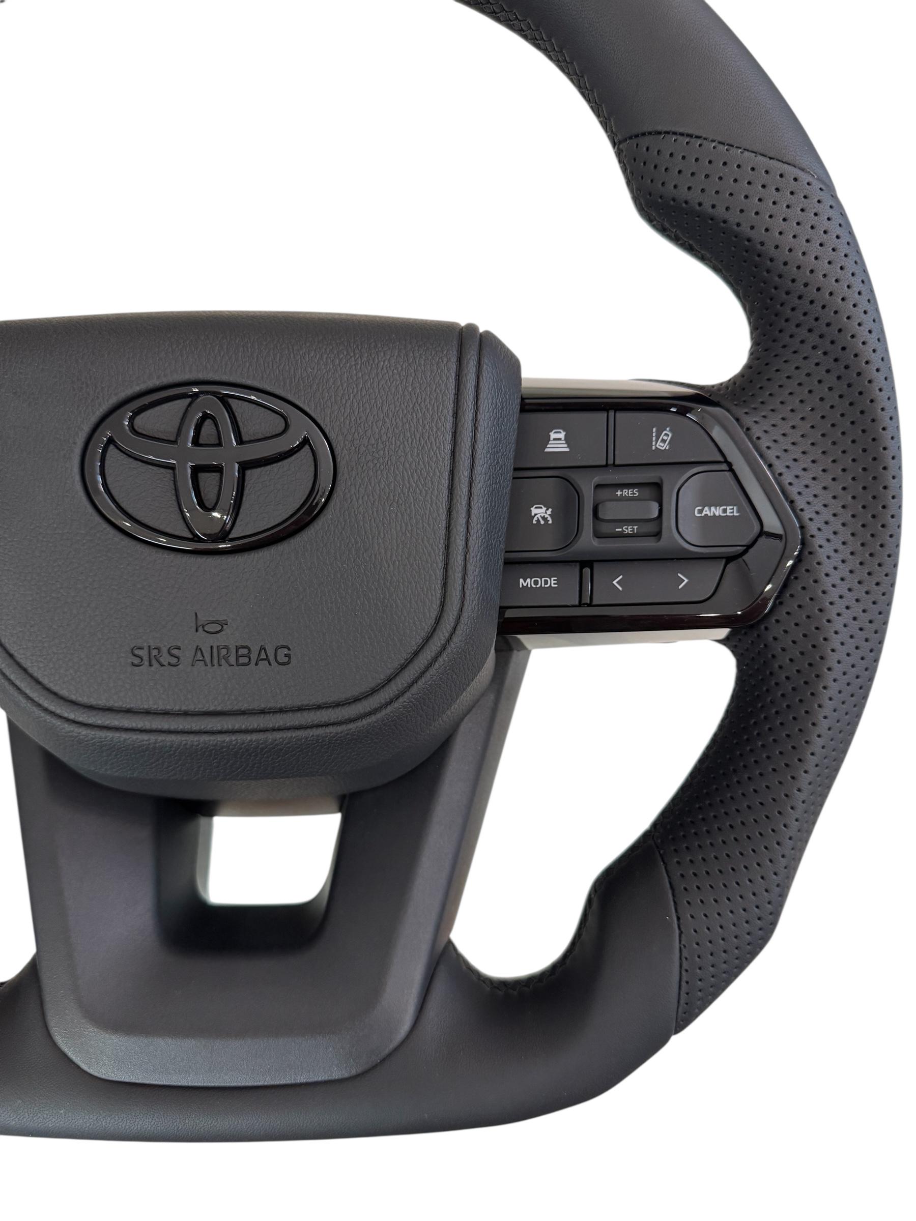 Кермо для Toyota Sequoia в сборі шкіра зі скошеним низом логотип чорний глянець (29371344) - фото 3 Кермо для Toyota Sequoia в сборі шкіра зі скошеним низом логотип чорний глянець (29371344) - фото 3