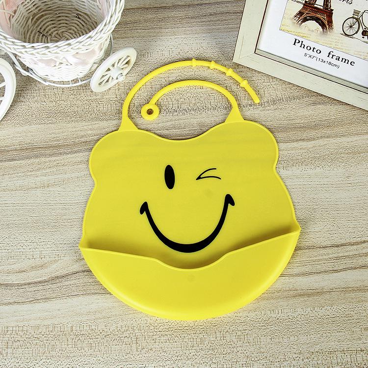 Слюнявчик силиконовый с карманом Смайл Желтый (1028414)