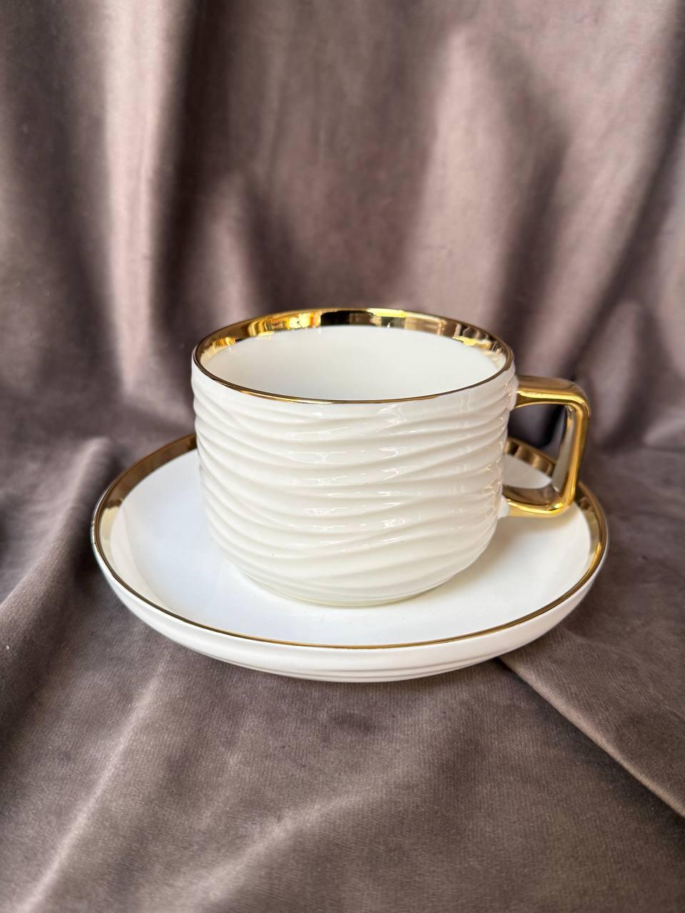 Чайный сервиз Yiwu 0350-2301 фарфоровый 200 мл 12 пр. Белый с золотым (33539102)