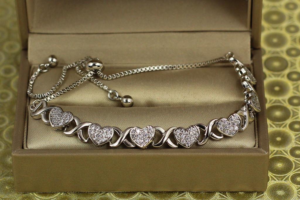 Браслет регулируемый Xuping Jewelry Семь сердец на бегуне Серебристый (2196407873)
