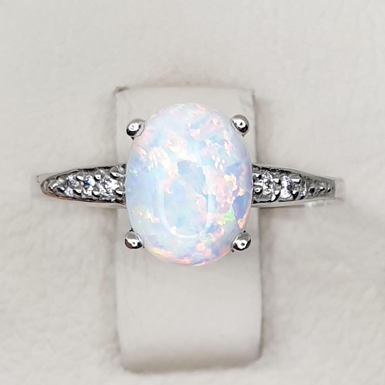 Кольцо серебряное с опалом р. 18 2,95 г (1428639263)