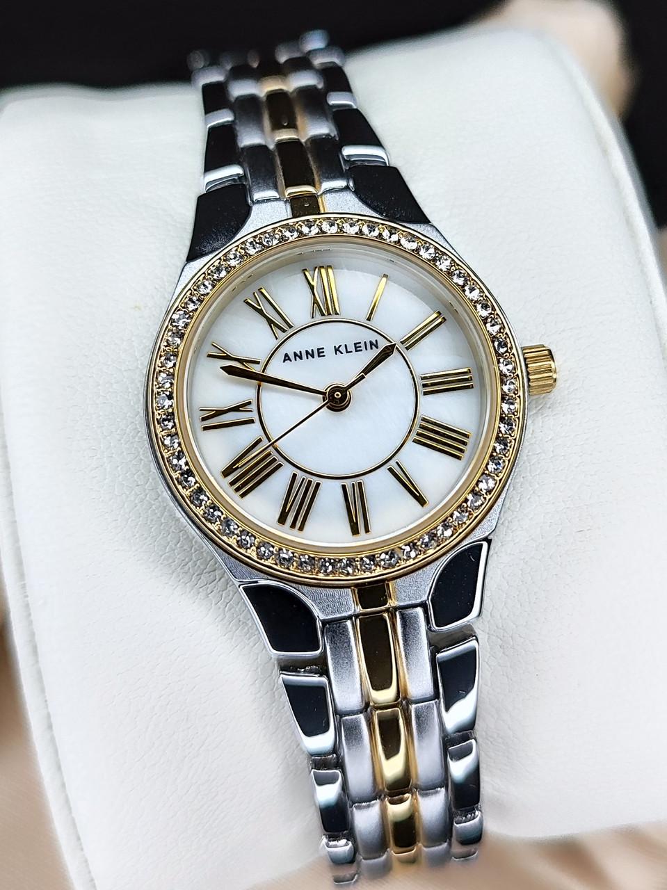 Наручные часы женские Anne Klein AK/5067MPTT с перламутровым циферблатом и серебристым стальным браслетом