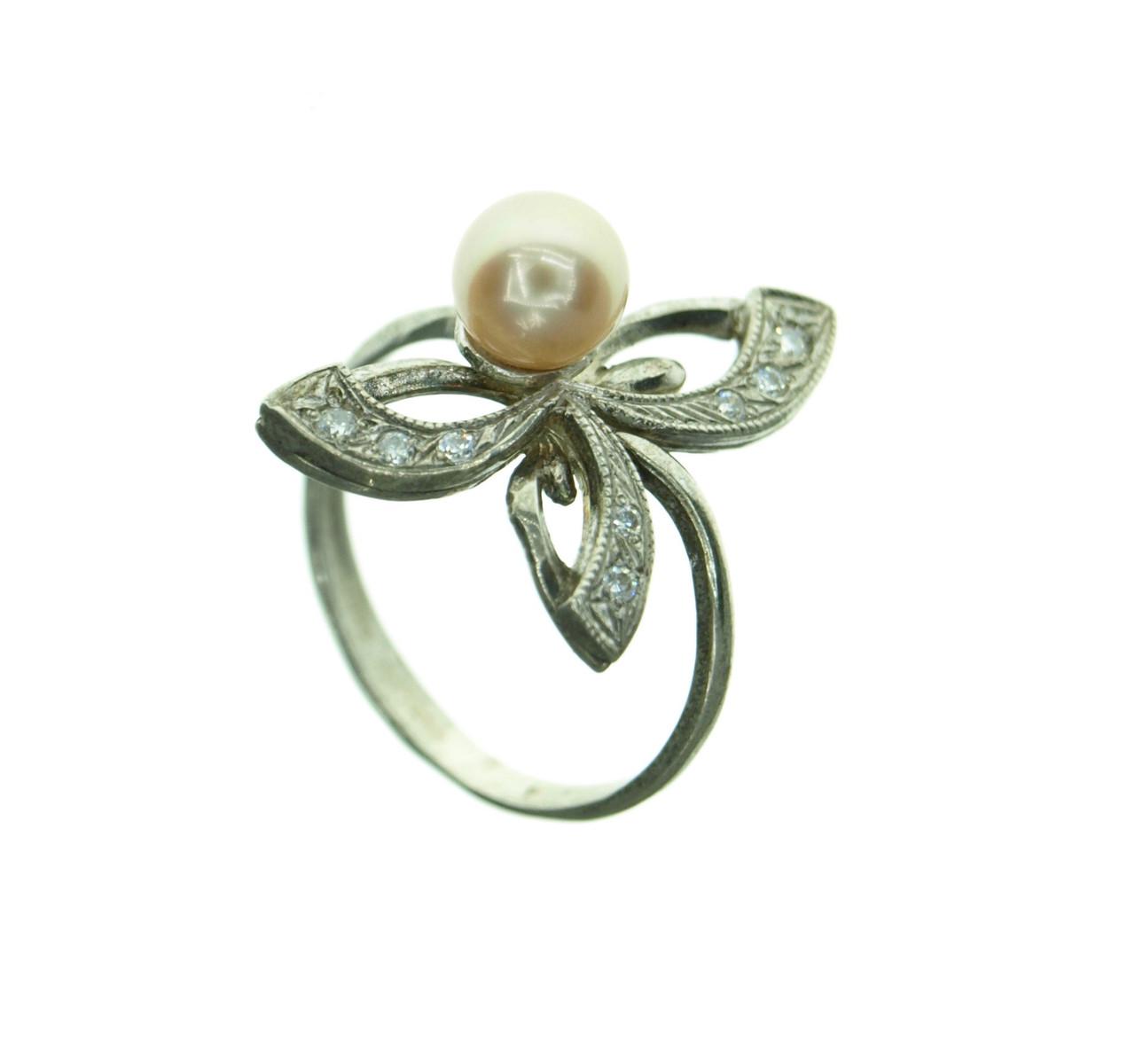 Кольцо из серебра с фианитом и жемчугом (2101750340)