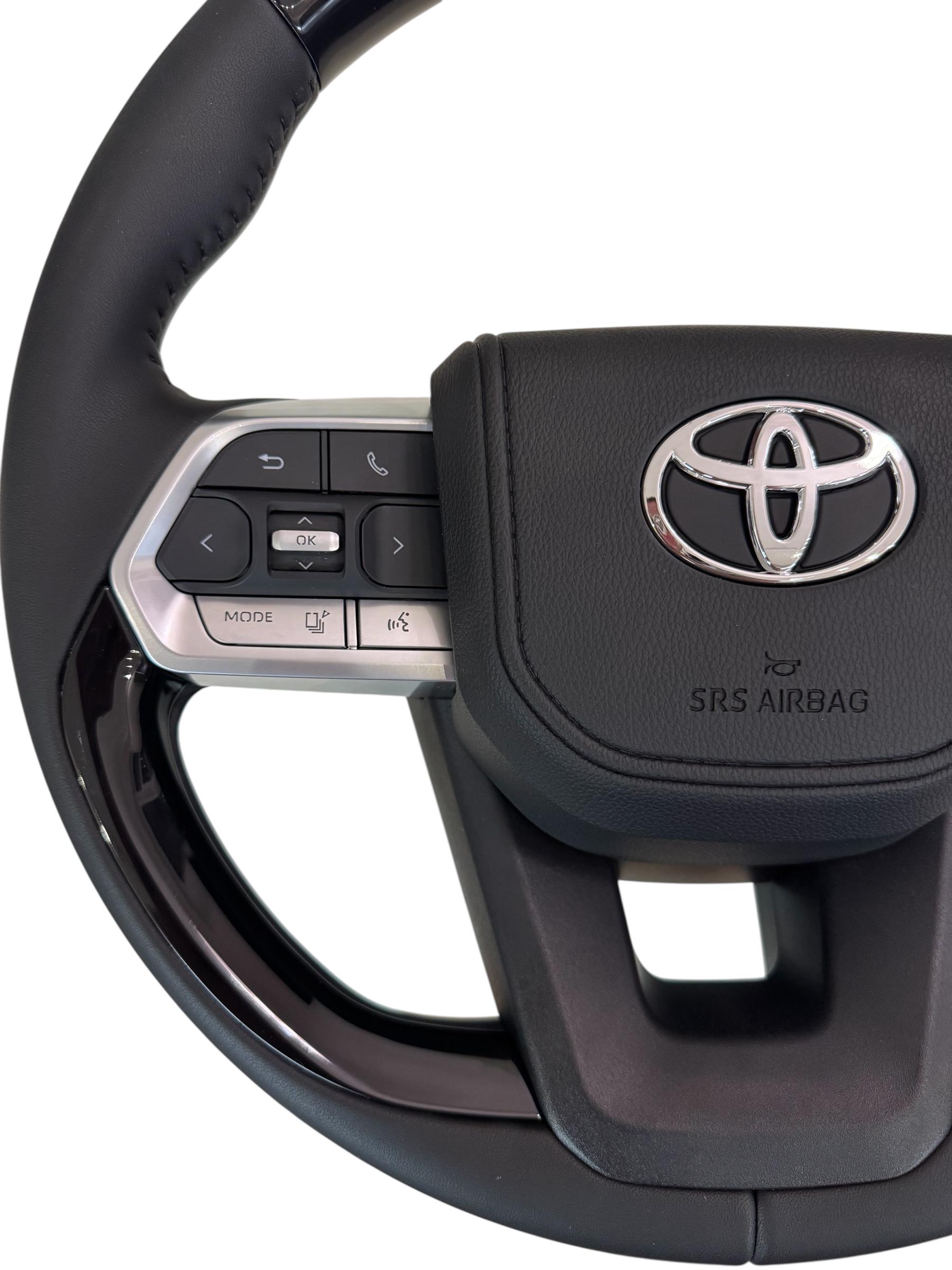 Руль для Toyota Land Cruiser 200 Prado 150 рояльный лак в стиле LC300 Хром (27709137) - фото 2 Руль для Toyota Land Cruiser 200 Prado 150 рояльный лак в стиле LC300 Хром (27709137) - фото 2