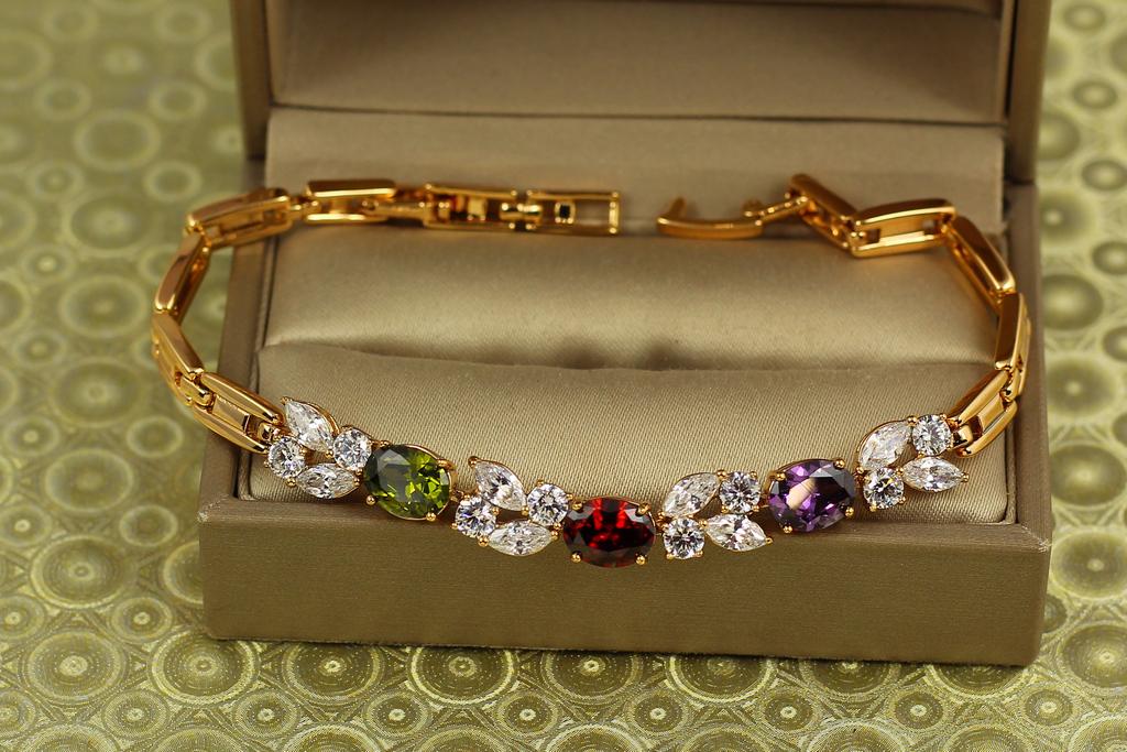 Браслет Xuping Jewelry Звездопад с темными разноцветными камнями 17,5 см Золотистый (31115864)