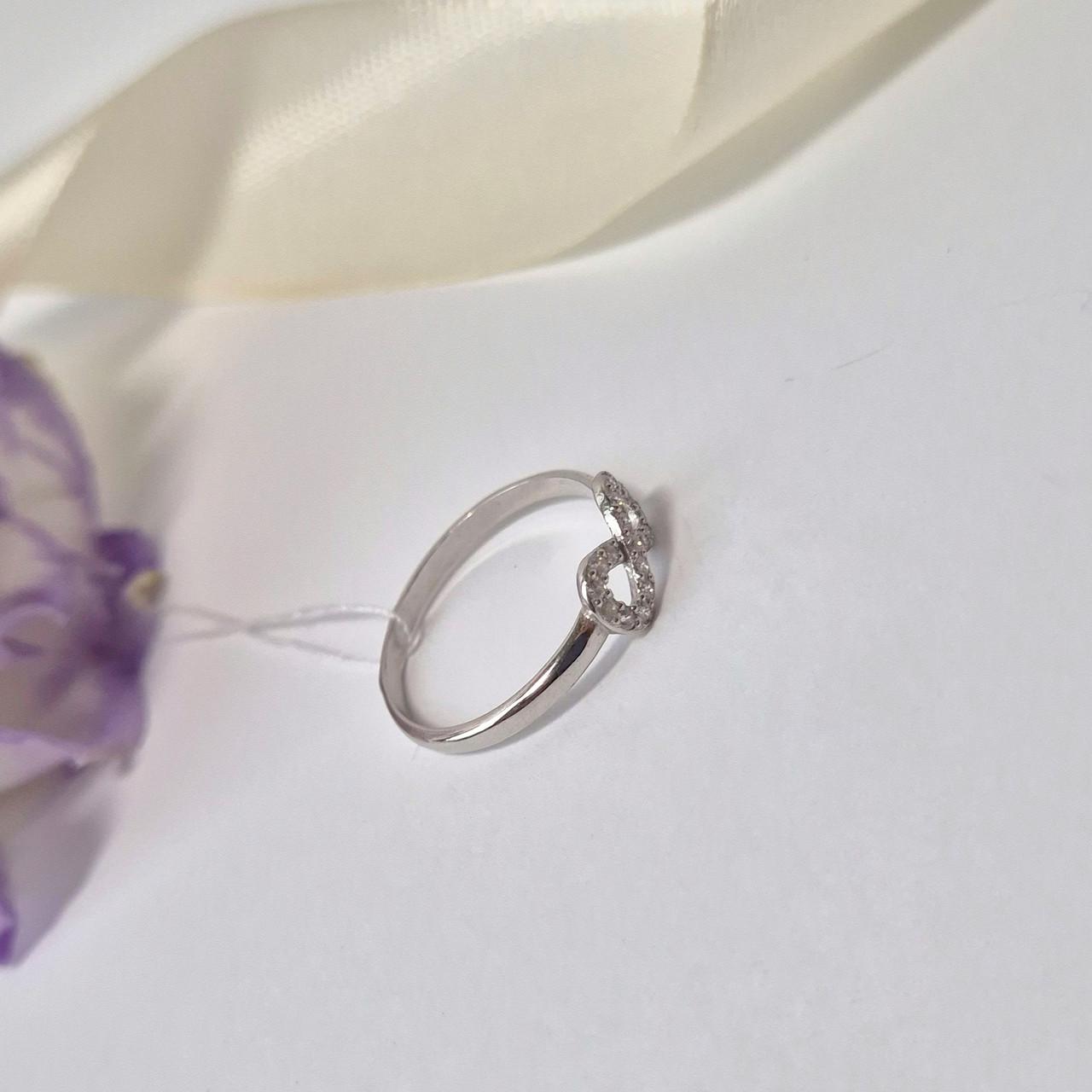 Каблучка нескінченність із білими каменями срібло 925 проби родоване 0,85 г р. 17,5 (1118r) - фото 4