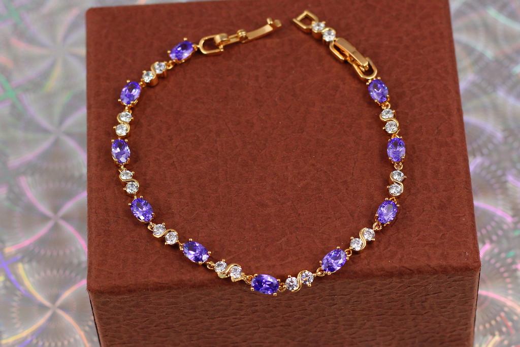 Браслет Xuping Jewelry Волна с фиолетовыми камнями 19 см 4 мм Золотистый
