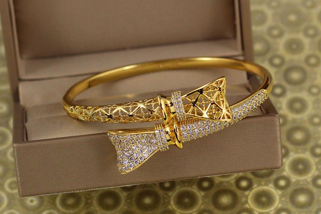 Браслет бенгл Xuping Jewelry бант 57 мм на руку от 16 до 18 см лимонный (26845251)