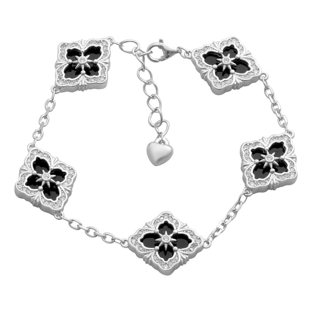 Браслет серебряный с ониксом в форме цветов