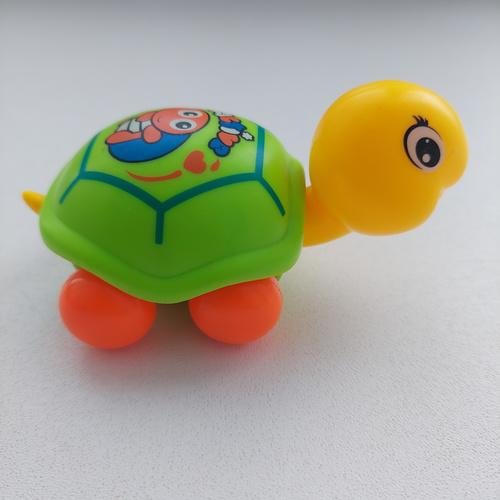 Игрушка заводная Ракушка ездит/двигает головой 9 см (6186 B)