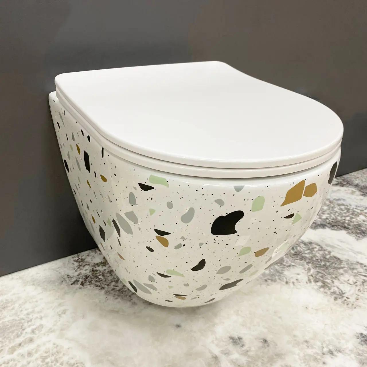 Унитаз подвесной VBI Vulcano Terazzo безобедочный 480x360 мм Белый (RM-VBI-020409) - фото 2 Унитаз подвесной VBI Vulcano Terazzo безобедочный 480x360 мм Белый (RM-VBI-020409) - фото 2