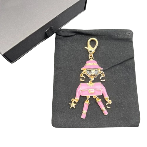 Брелок-підвіска дизайнерський Chanel Лялька в окулярах Pink/Gold Брелок-підвіска дизайнерський Chanel Лялька в окулярах Pink/Gold