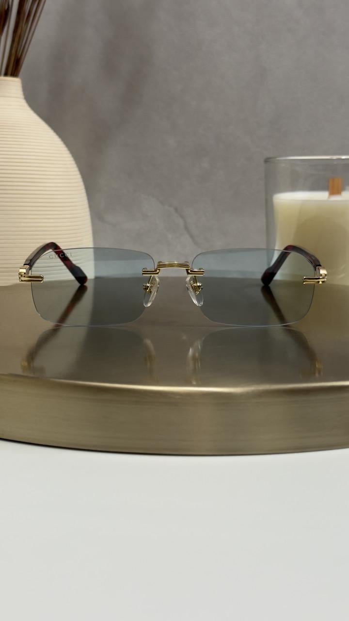 Солнцезащитные очки Gucci GG1221S 003