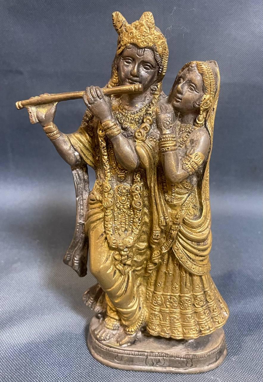 Статуетка Радха і Крішна символ божественної любові єдності та гармонії