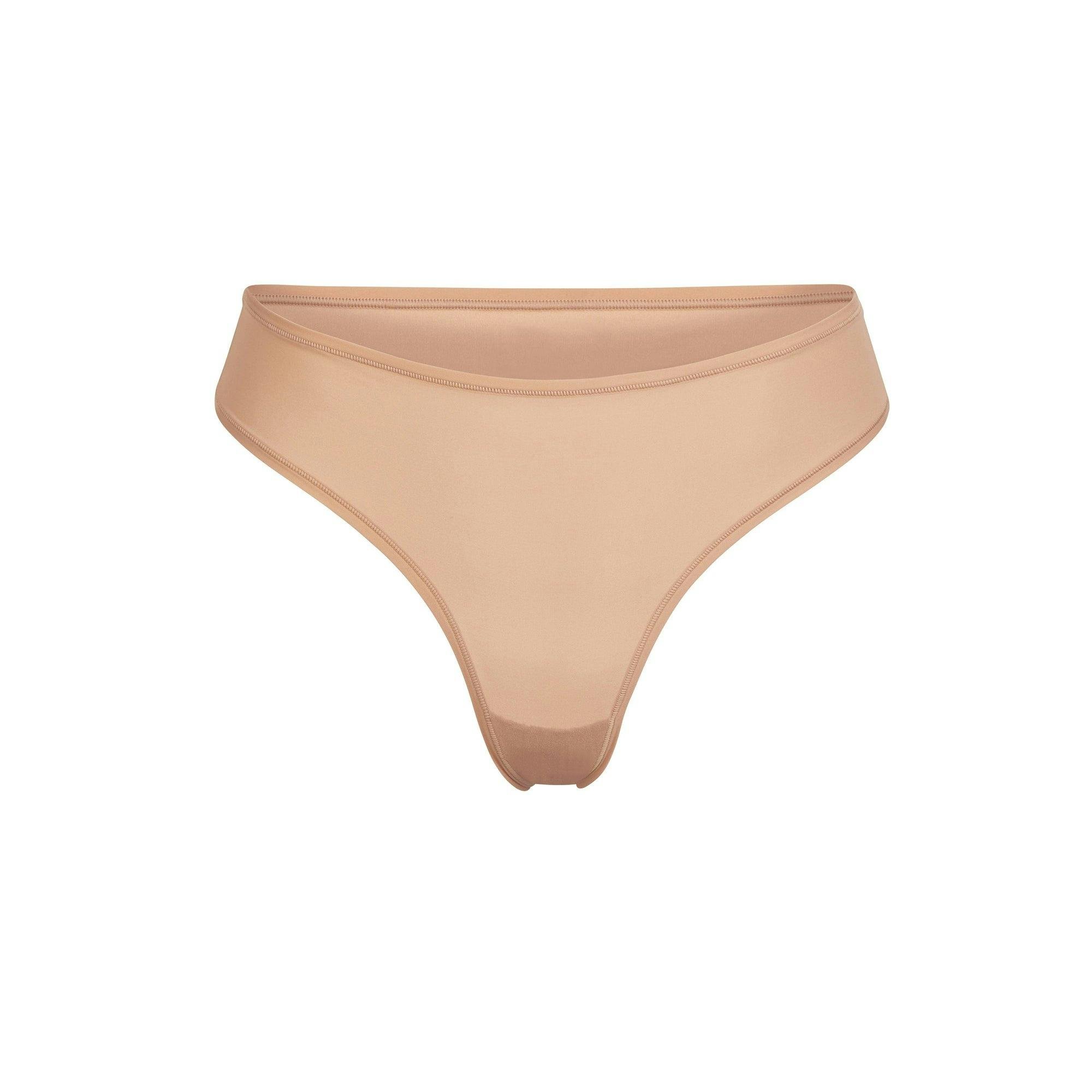 Трусы SKIMS Fits everybody Thong Ochre М (22128496)