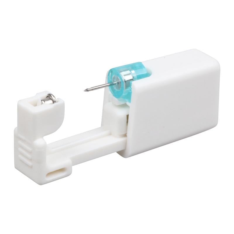 Пістолет одноразовий для проколу вух з медичною сережкою (29465) Пістолет одноразовий для проколу вух з медичною сережкою (29465)