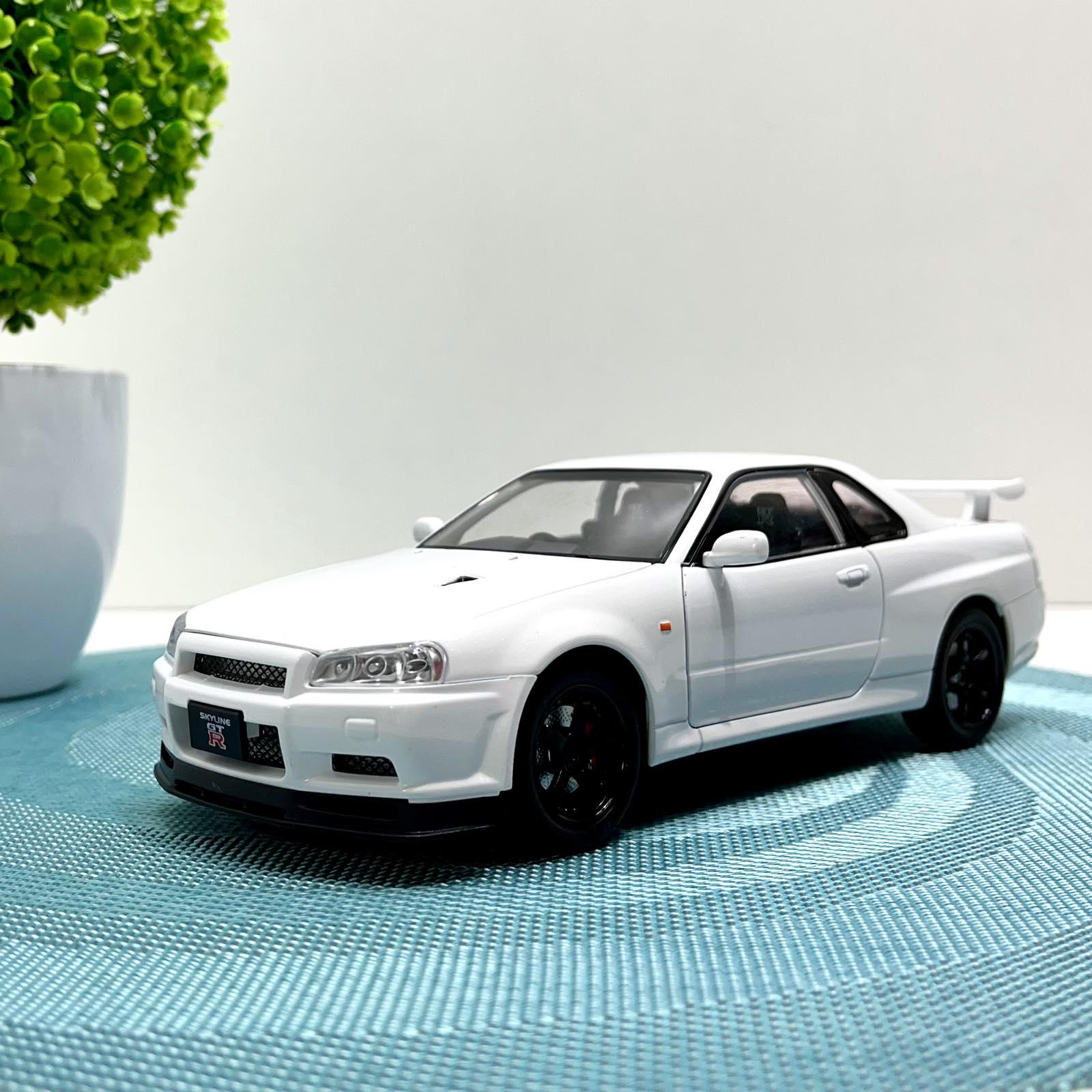 Машинка металлическая Авто Эксперт Nissan GT-R 1:24 свет/звук открывается дверь капот багажник Белый (1990-21)