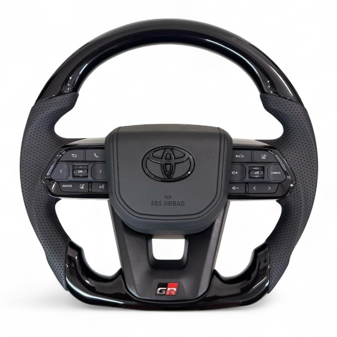 Кермо для Toyota Hilux GR в сборі рояльний лак зі скошеним низом логотип чорний глянець (29390082)