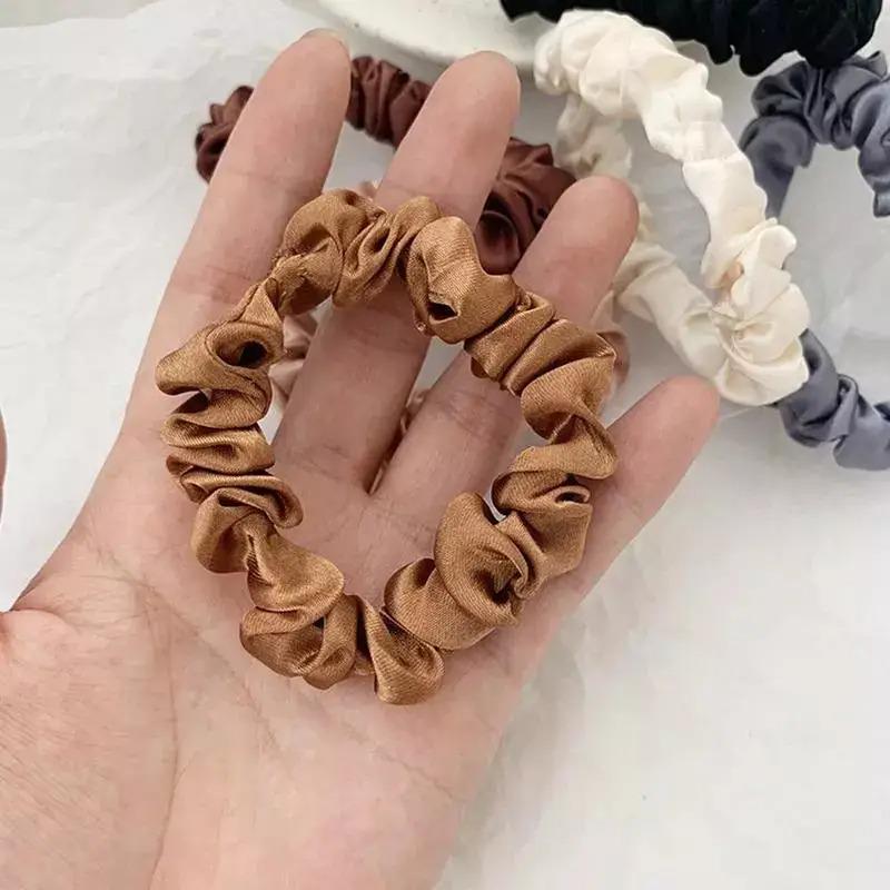 Набір жіночих резинок для волосся атласні еластичні міцні однотонні 6 шт. - фото 9 Набір жіночих резинок для волосся атласні еластичні міцні однотонні 6 шт. - фото 9