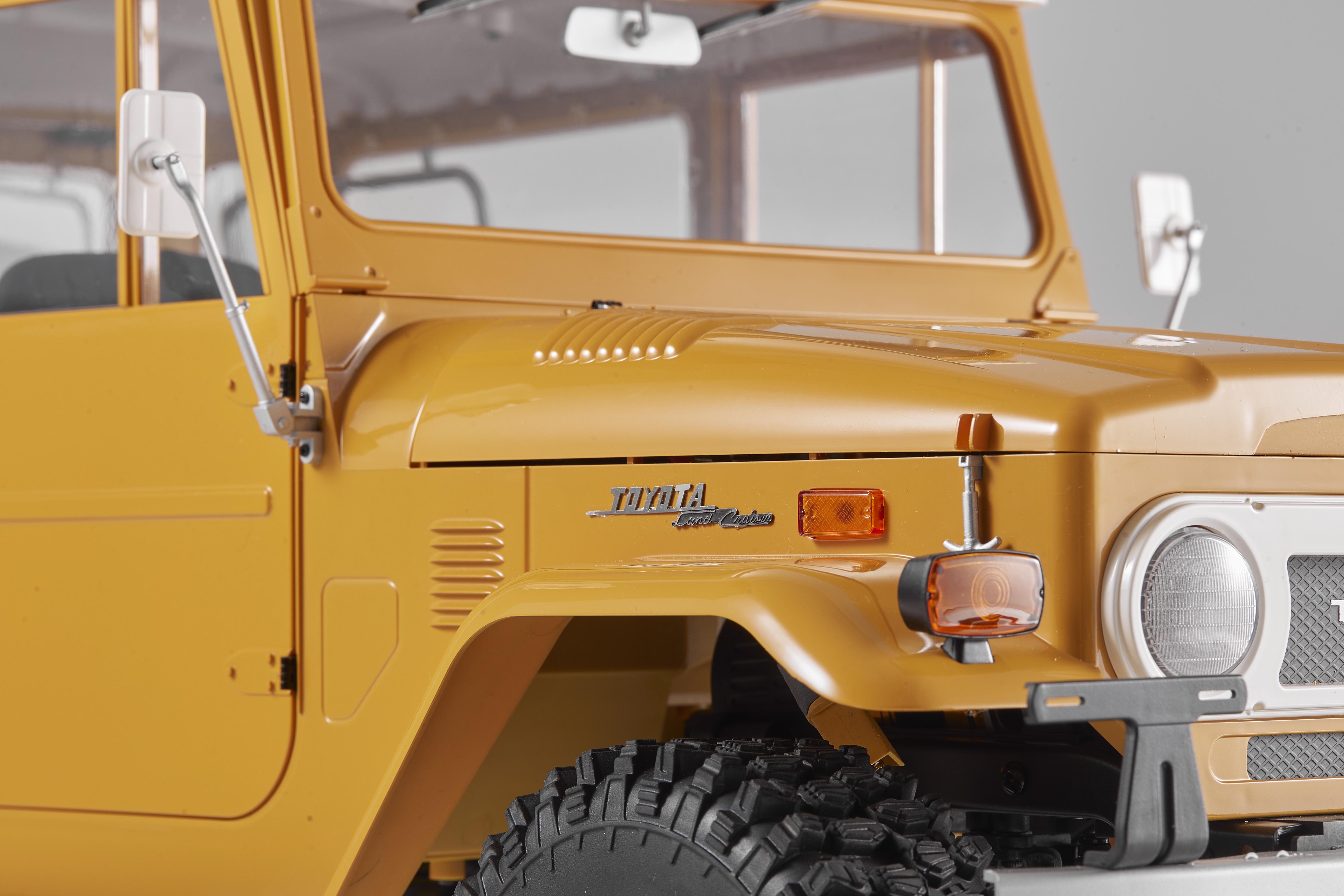 Машинка на радиоуправлении FMS 1:10 Toyota Land Cruiser FJ40 RS Yellow - фото 15 Машинка на радиоуправлении FMS 1:10 Toyota Land Cruiser FJ40 RS Yellow - фото 15