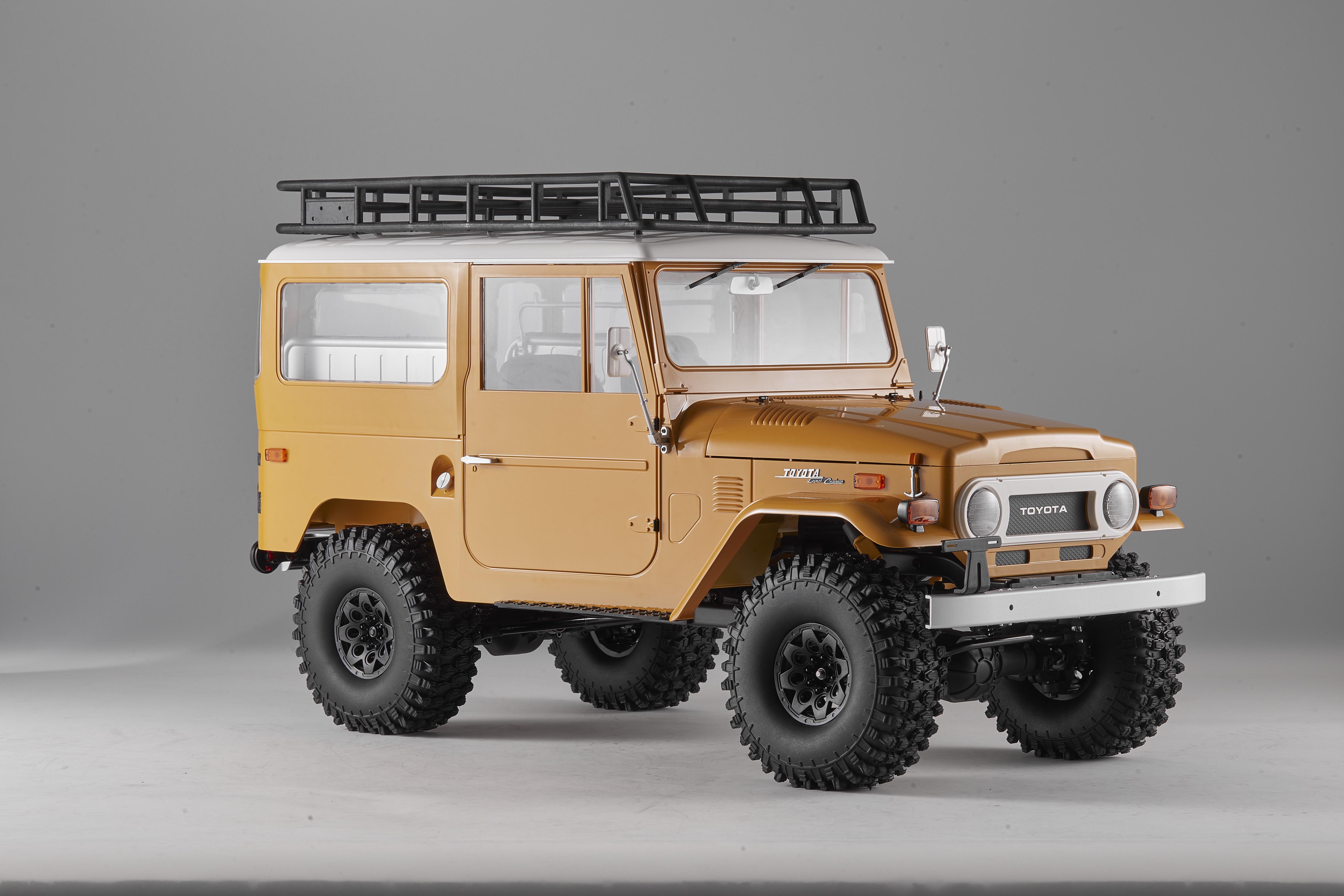 Машинка на радиоуправлении FMS 1:10 Toyota Land Cruiser FJ40 RS Yellow - фото 10 Машинка на радиоуправлении FMS 1:10 Toyota Land Cruiser FJ40 RS Yellow - фото 10