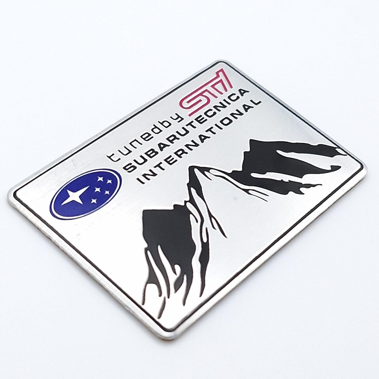Эмблема алюминиевая STI SUBARU Subaru tecnica international 6х4 см (2390896426)