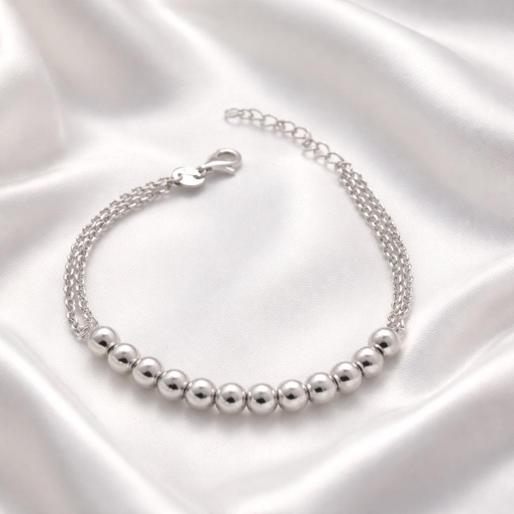 Браслет серебрянный с глянцевыми серебряными шариками круглой формы и тройной цепочкой р. 17-20 см