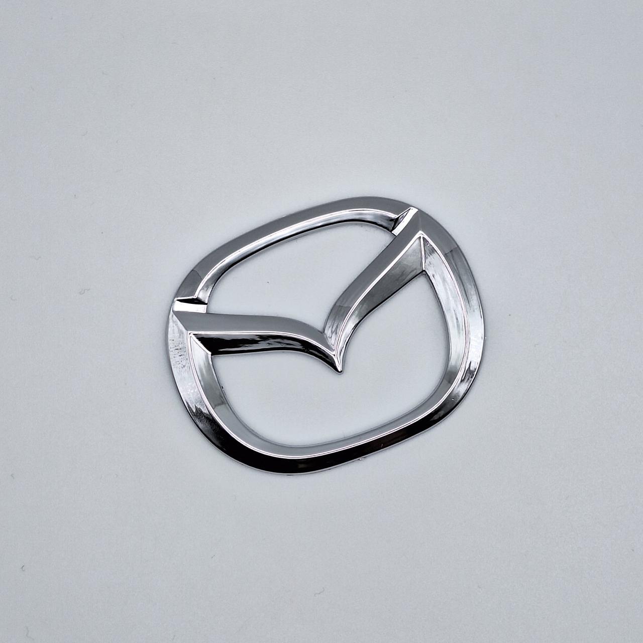 Эмблема Mazda Хром 60х48 мм (1947692261)