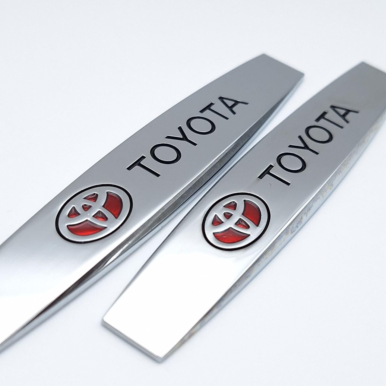 Эмблема на крылья Toyota 10х1,8 см Хром глянцевый (2390742007)