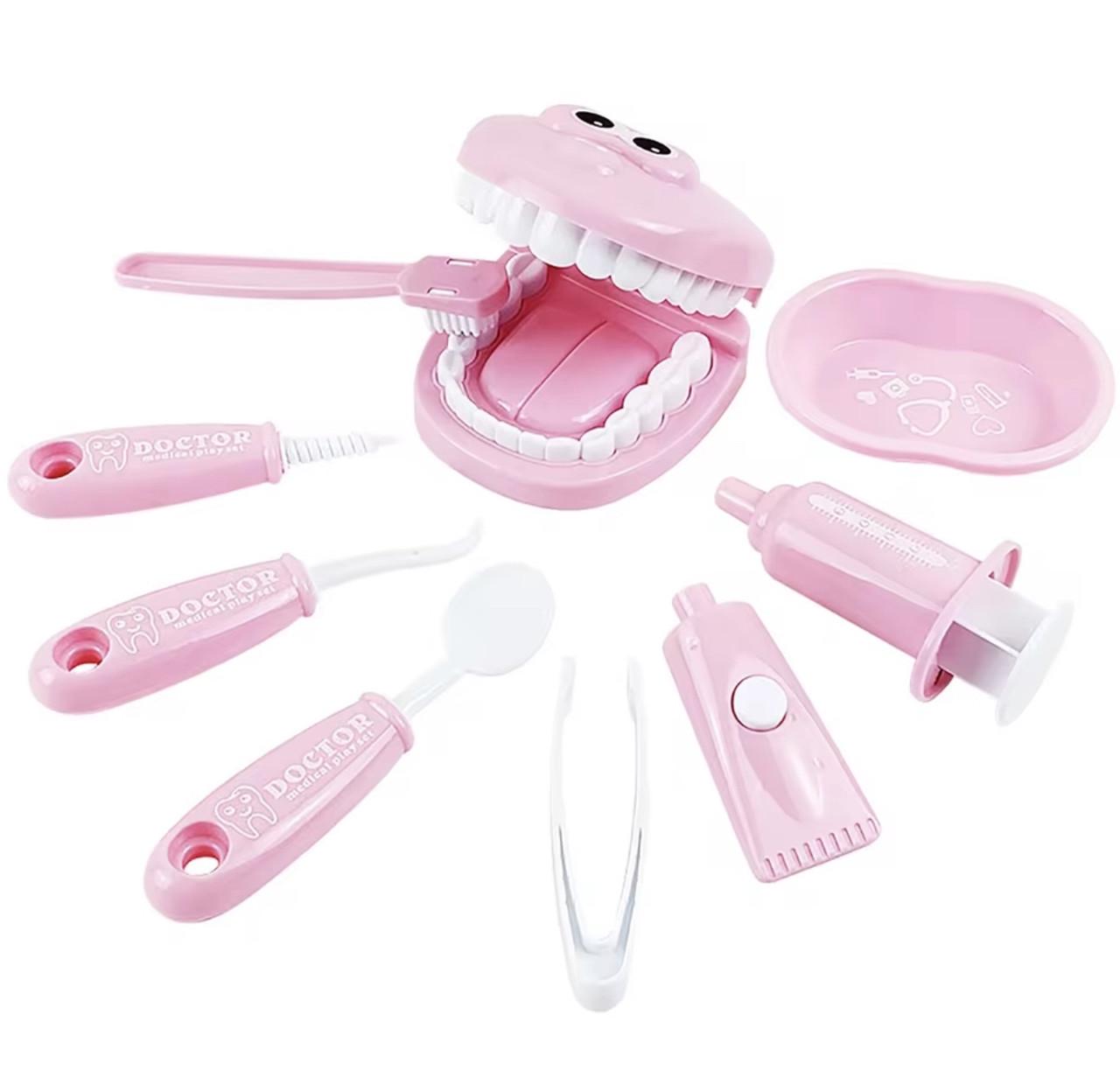 Детский набор стоматолога с зубами и инструментами 9 элементов Розовый (55/3) - фото 1 Детский набор стоматолога с зубами и инструментами 9 элементов Розовый (55/3) - фото 1
