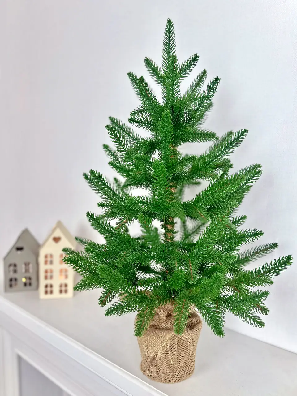 Елка новогодняя литая пышная в мешковине 70 см (210N/70/G)