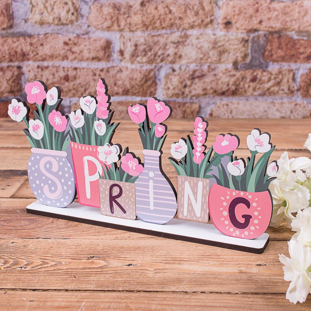 Деревянная статуэтка (Spring)