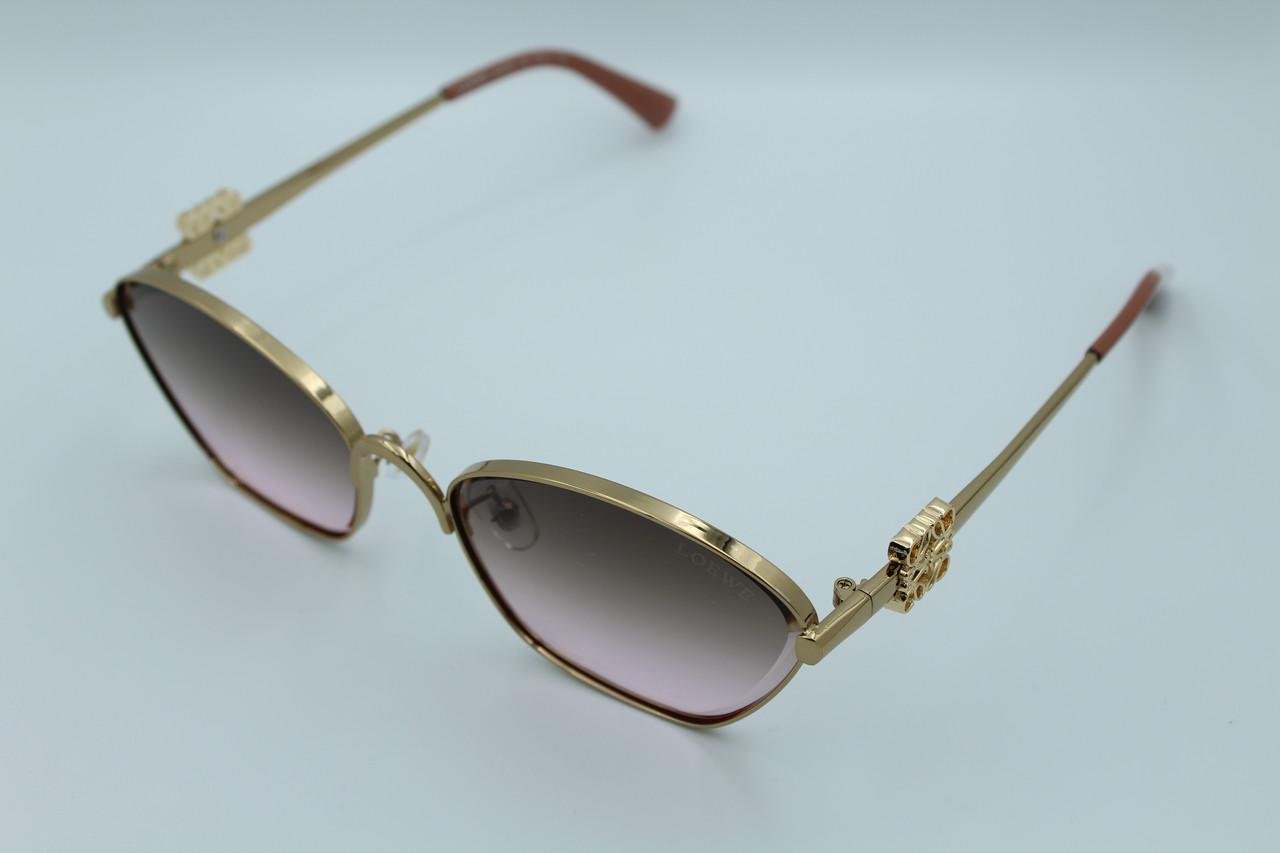 Сонцезахисні окуляри жіночі дизайнерські (19410 col 4) - фото 4 Сонцезахисні окуляри жіночі дизайнерські (19410 col 4) - фото 4