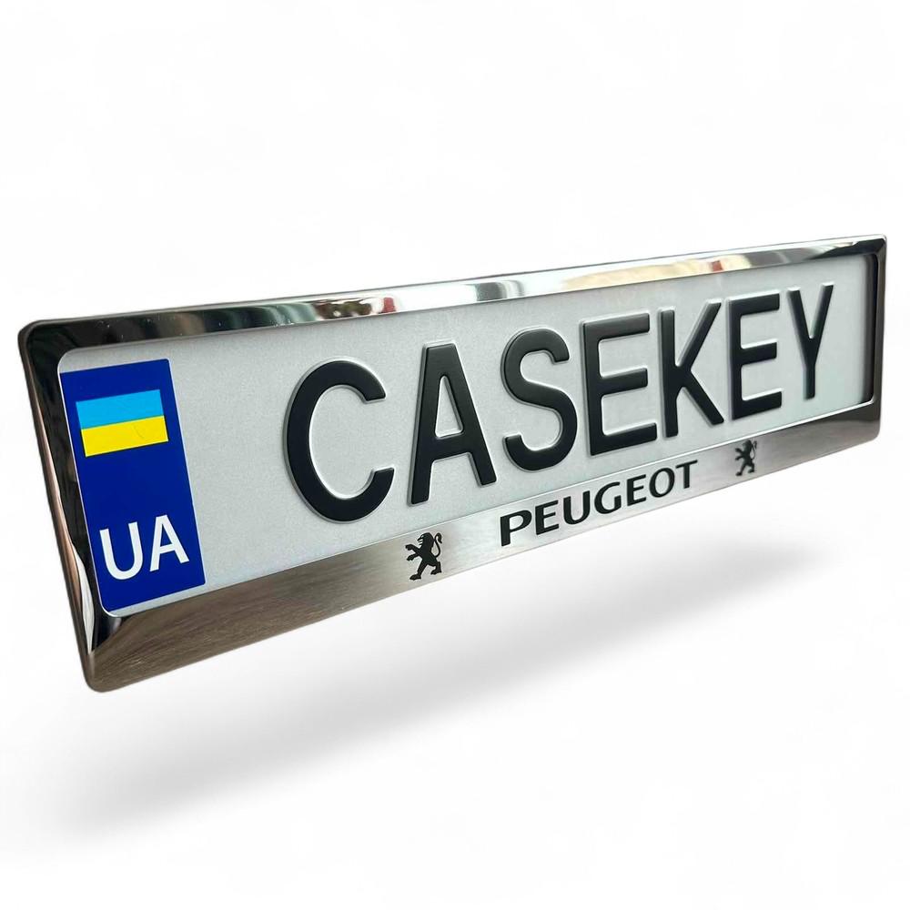 Авторамка метелічна з гравіюванням Peugeot (peramkaza1)