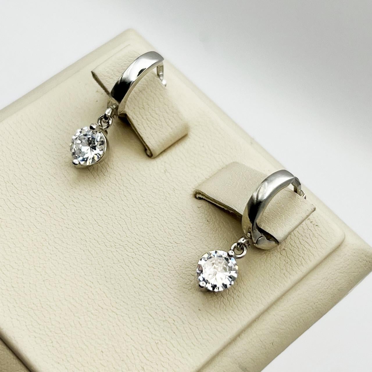 Серебряные серьги-кольца с кубическим цирконием 3,05 г (2448730202) Серебряные серьги-кольца с кубическим цирконием 3,05 г (2448730202)