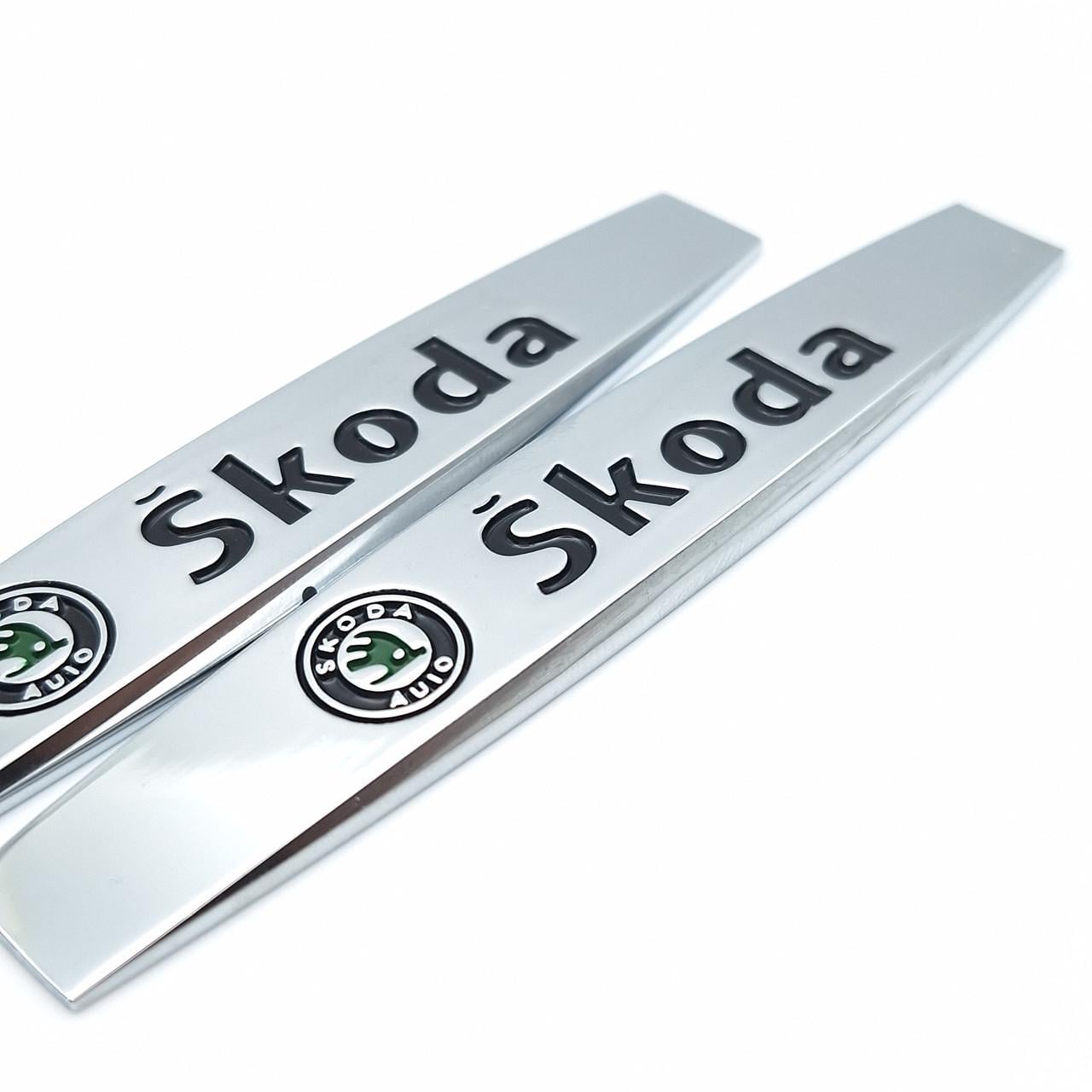 Эмблема на крылья Skoda 10х1,8 см Хром глянцевый (1996620008)