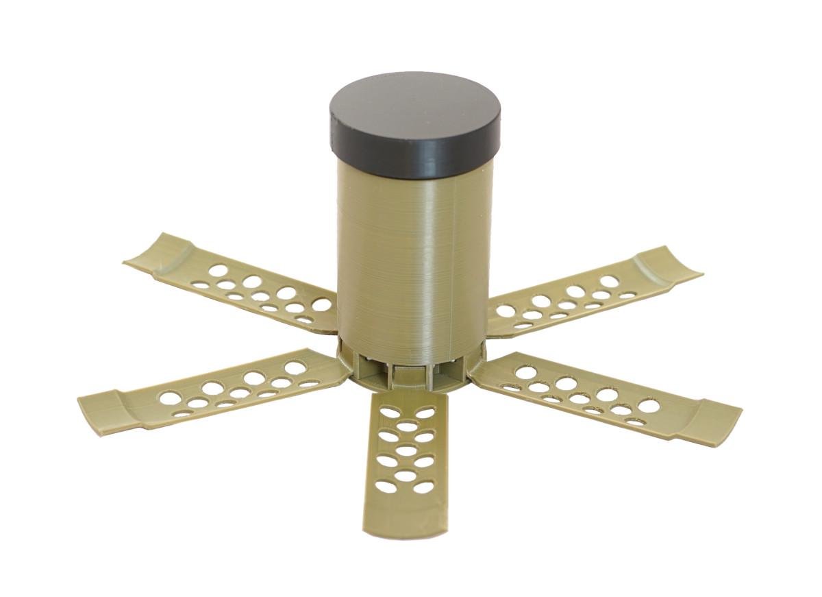 Макет противопехотной мины ПОМ-2 осколковочного натяжного действия.