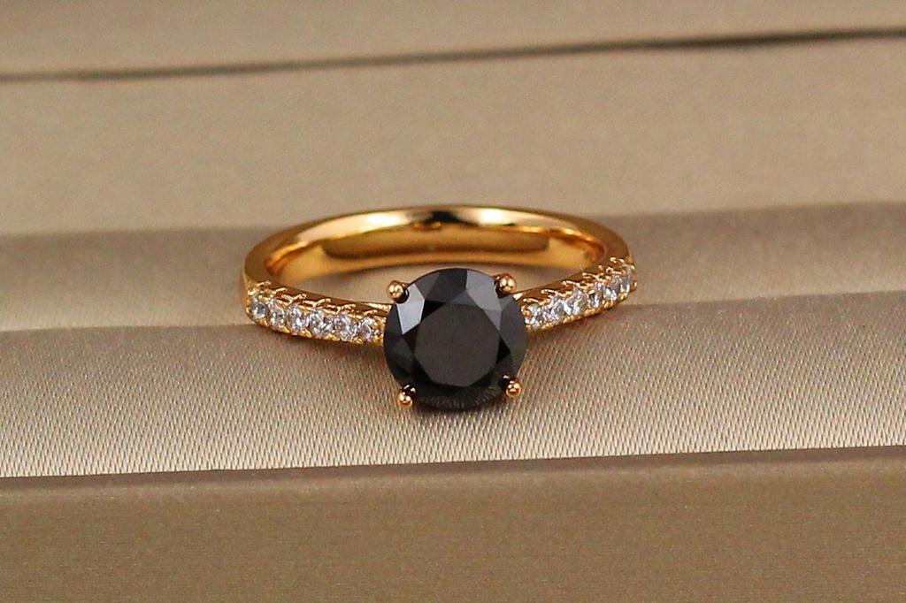 Каблучка Xuping Jewelry чорний фіаніт з боків білі камені р. 16 Золотистий (1502735163)