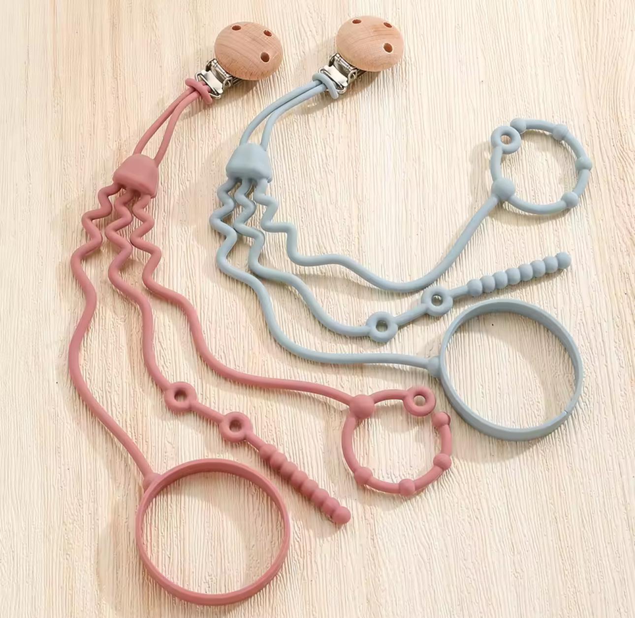 Держатель силиконовый для бутылочки/пустышки/игрушек и клипсы Розовый - фото 7 Держатель силиконовый для бутылочки/пустышки/игрушек и клипсы Розовый - фото 7