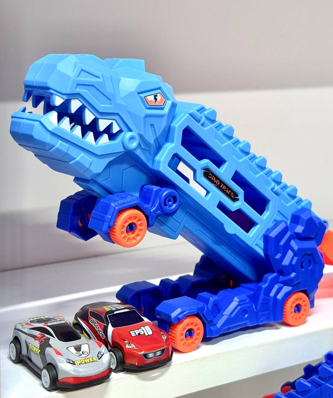 Трейлер-трансформер з механічним запуском машинок Dino Y2155A та 2 інерційні машинки (2761159533) - фото 9