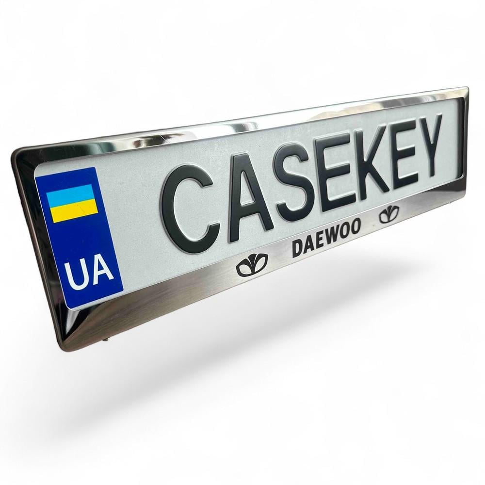 Авторамка метелическая с гравировкой Daewoo (deramkaza1)
