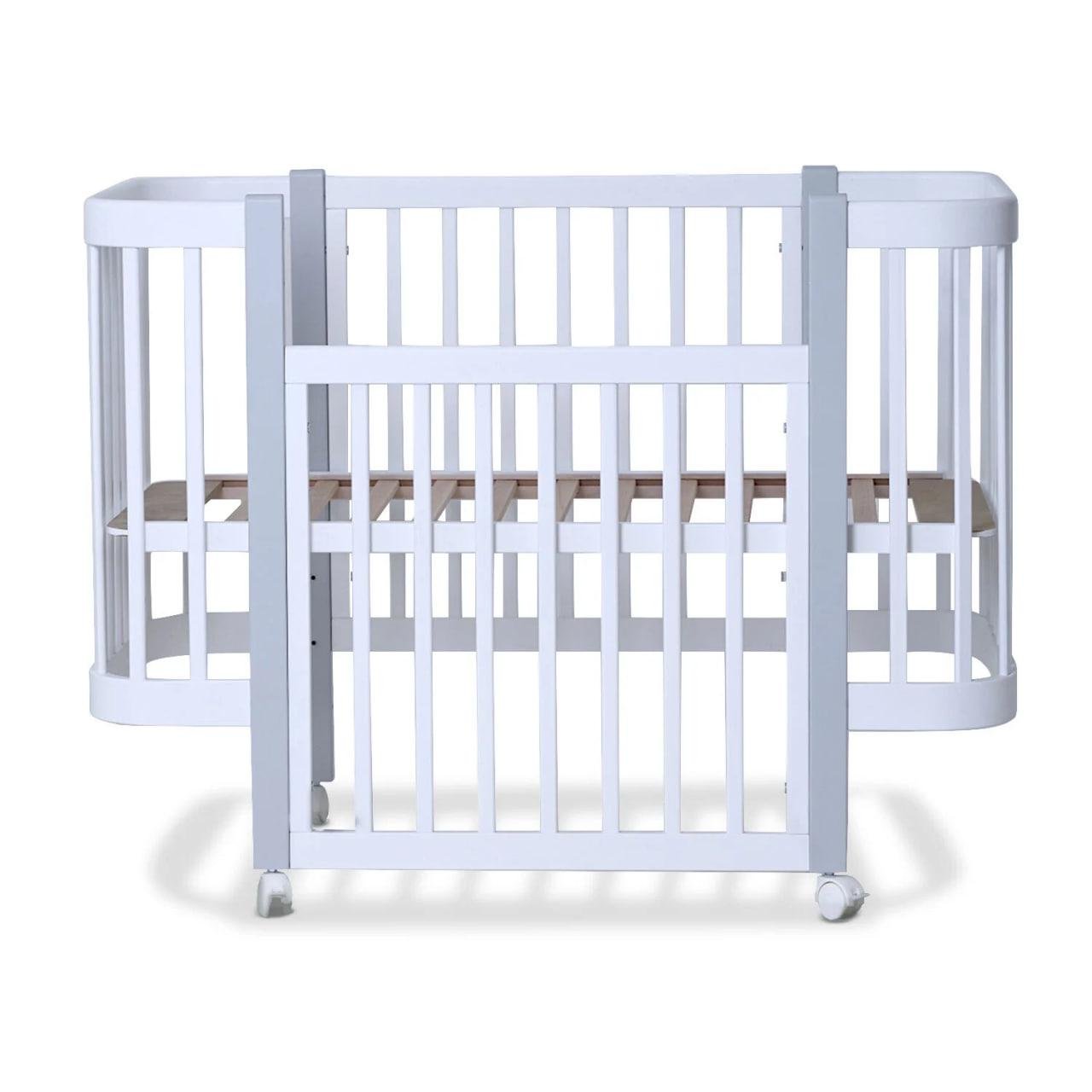Кроватка деревянная с регулировкой высоты дна и колесами (28123116)
