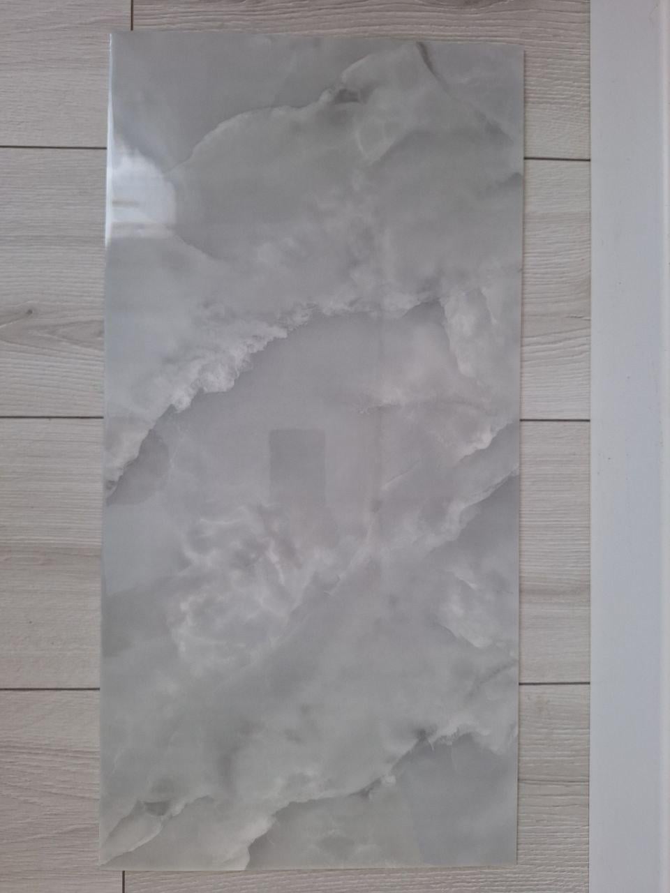 Плитка-самоклейка вінілова мармур 600х300х2 мм глянцевий (F025)