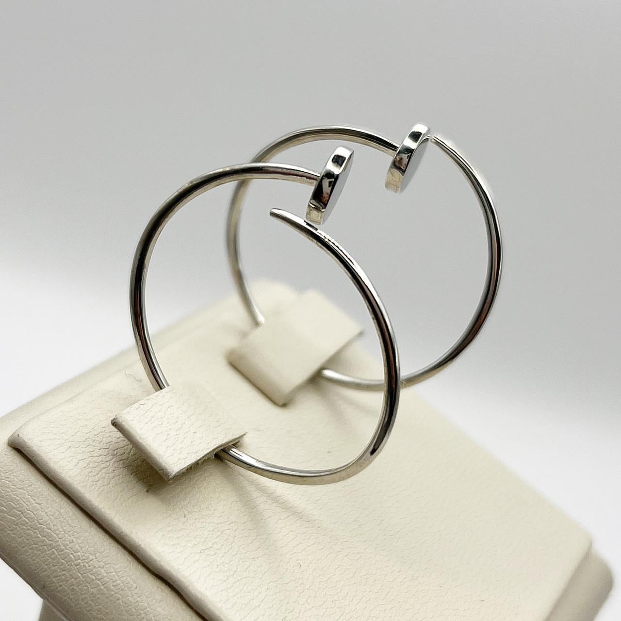 Серебряные серьги-кольца Картье 30 мм 3,84 г (2501046822) Серебряные серьги-кольца Картье 30 мм 3,84 г (2501046822)