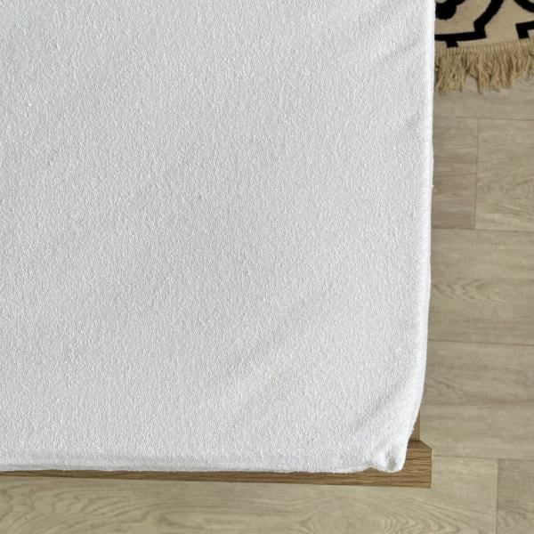 Наматрасник водонепроницаемый с резинкой по всему периметру 63х125 см (17004) - фото 2