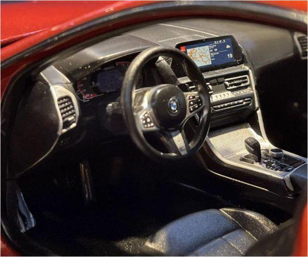 Модель автомобиля Norev 1:18 BMW 8 G15 Series Coupe Orange Metallic (183285) - фото 2 Модель автомобиля Norev 1:18 BMW 8 G15 Series Coupe Orange Metallic (183285) - фото 2