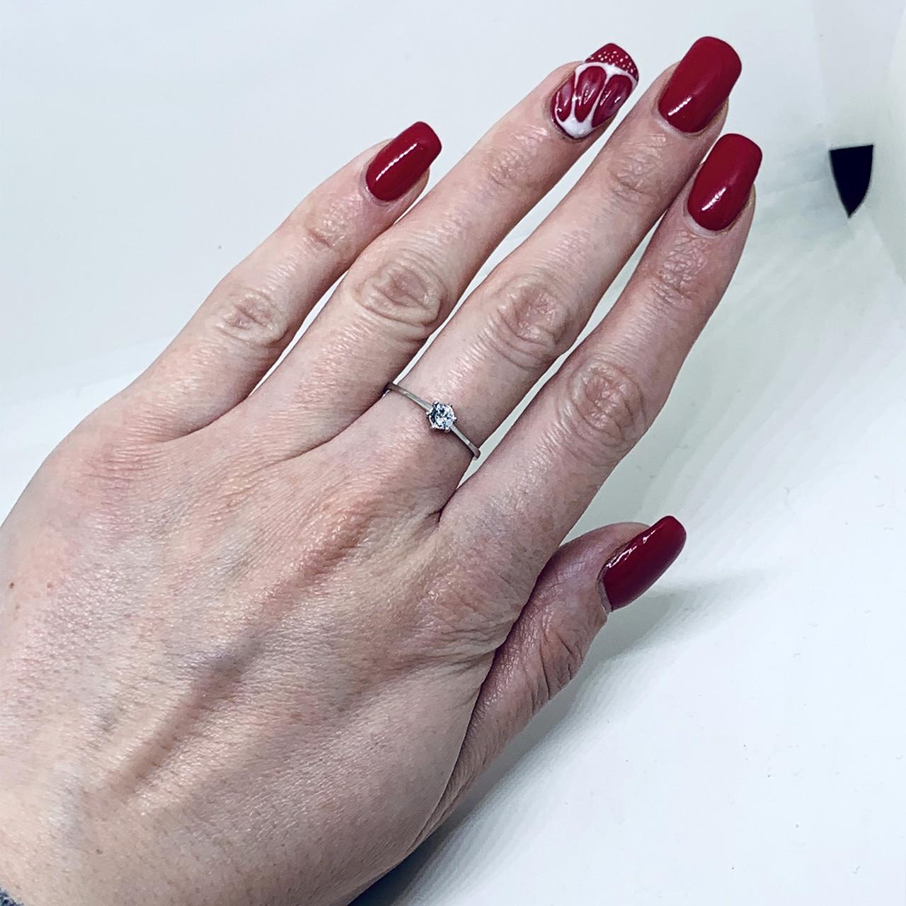 Кольцо серебряное с кубическим цирконием р. 17 1,02 г (1550652013)