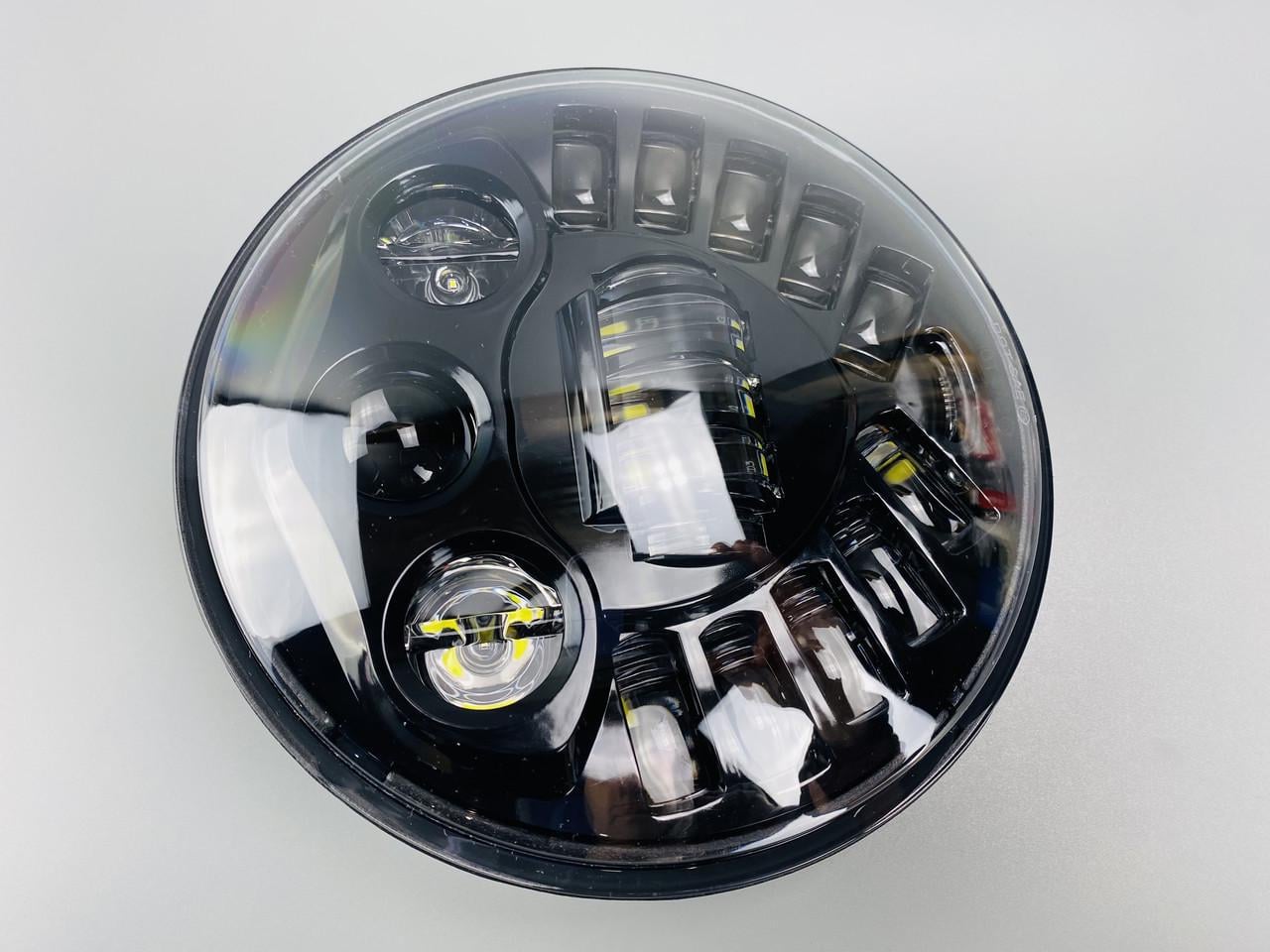 Фара LED 65W ближний/дальний/ходовые огни 7" (2436675038)