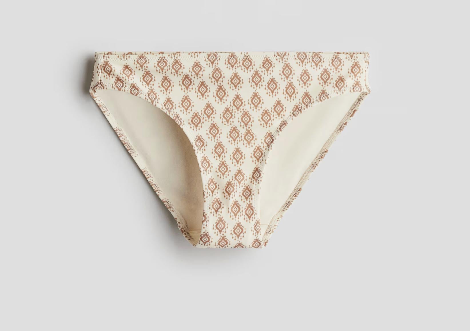 Купальные трусики H&M 1219268ОА принт 134-140 см Молочный