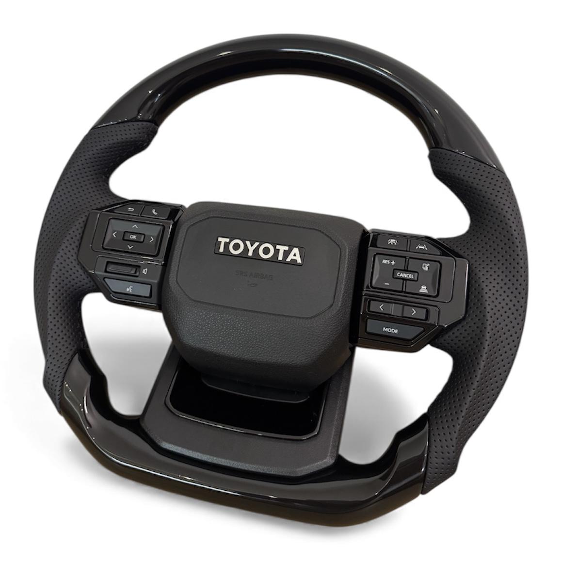 Руль анатомический для Toyota Land Cruiser 100/Prado 120 в стиле Prado 250 логотип хром (30583885) - фото 4 Руль анатомический для Toyota Land Cruiser 100/Prado 120 в стиле Prado 250 логотип хром (30583885) - фото 4